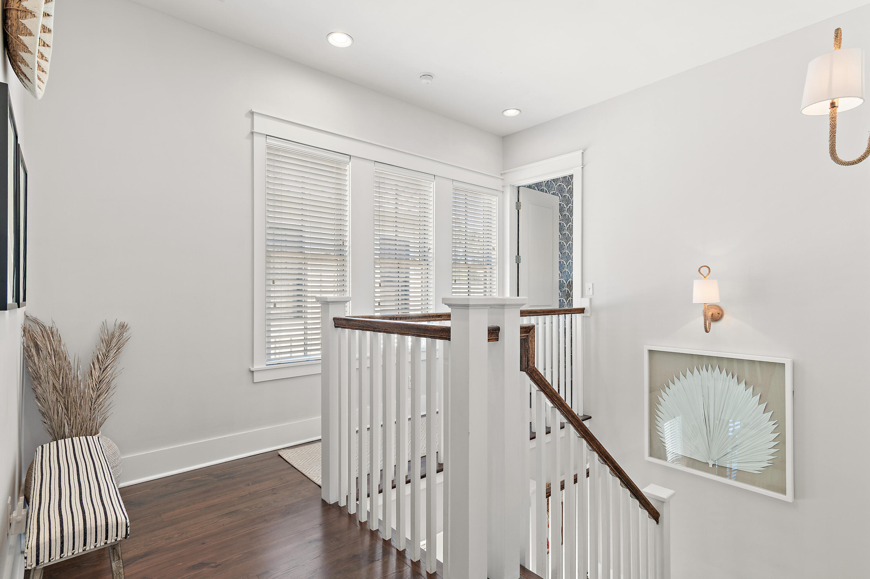 624 Sandgrass Boulevard Santa Rosa Beach, FL 32459 - Photo 24 of 51 a view of an empty room with wooden floor and a window