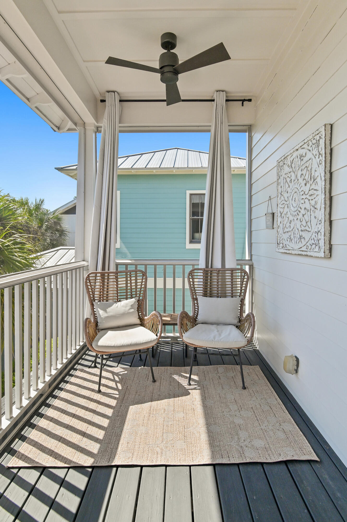 624 Sandgrass Boulevard Santa Rosa Beach, FL 32459 - Photo 28 of 51 a view of a patio with a table and chairs