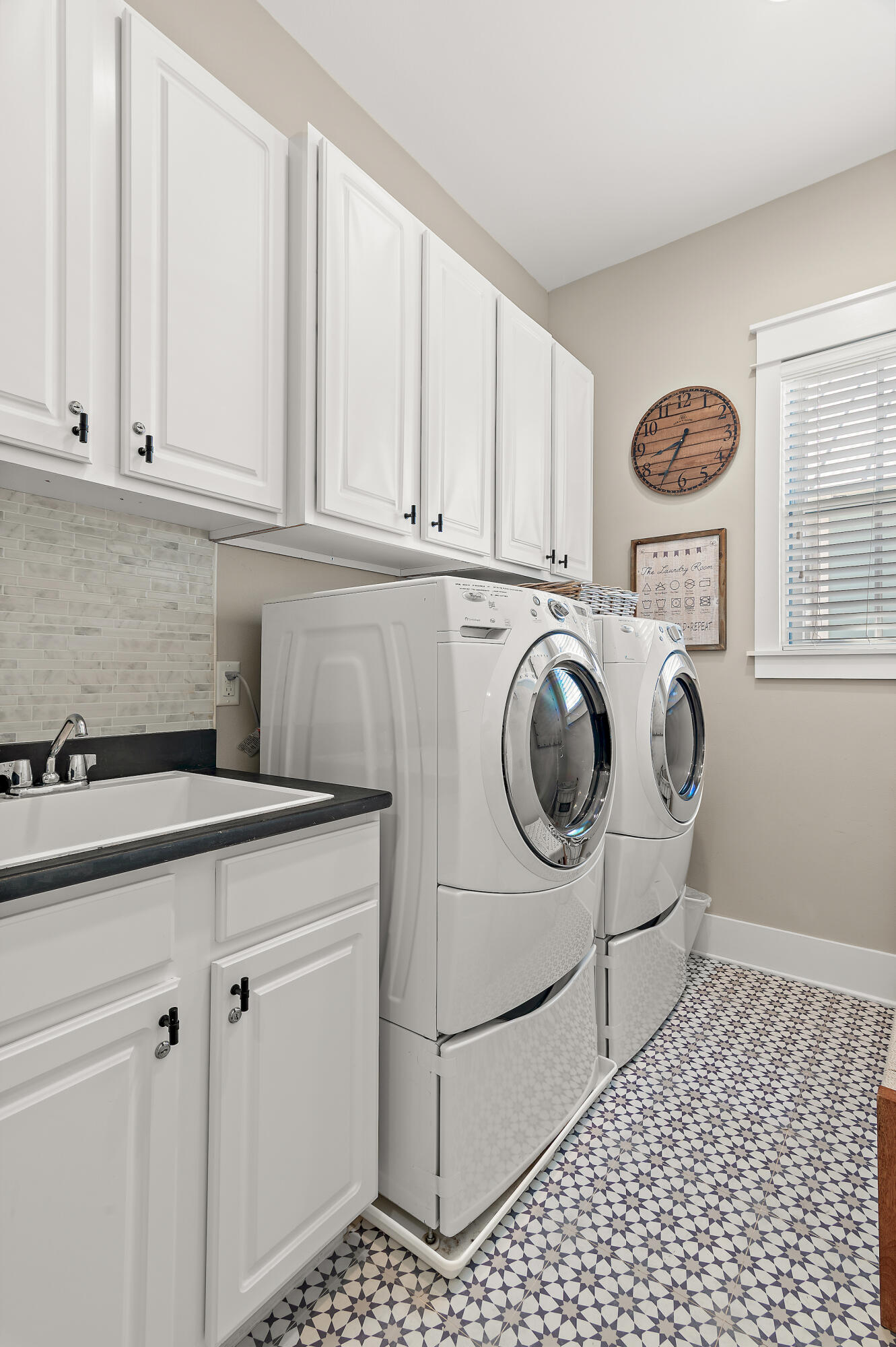 624 Sandgrass Boulevard Santa Rosa Beach, FL 32459 - Photo 34 of 51 a utility room with dryer and washer