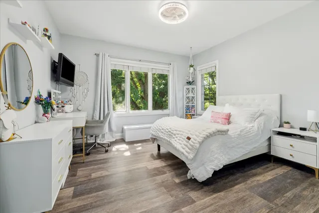 a kitchen with stainless steel appliances granite countertop a stove and cabinets