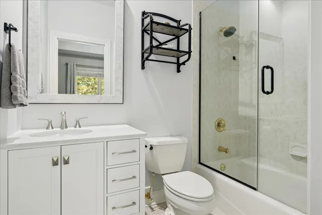 a view of a deck with furniture and a yard