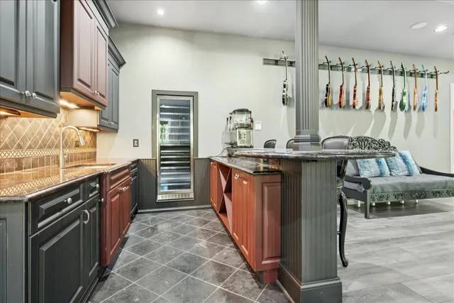 a green field with lots of bushes