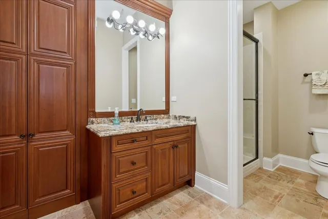 a view of a house with a yard and tree s