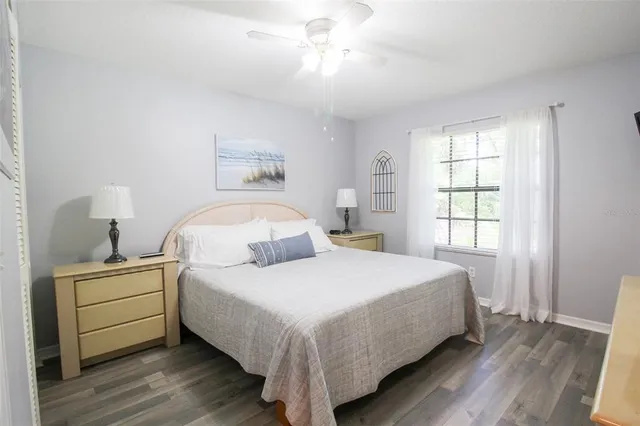 a large kitchen with a table and chairs