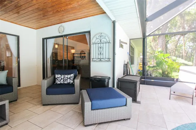 a view of a swimming pool with a patio