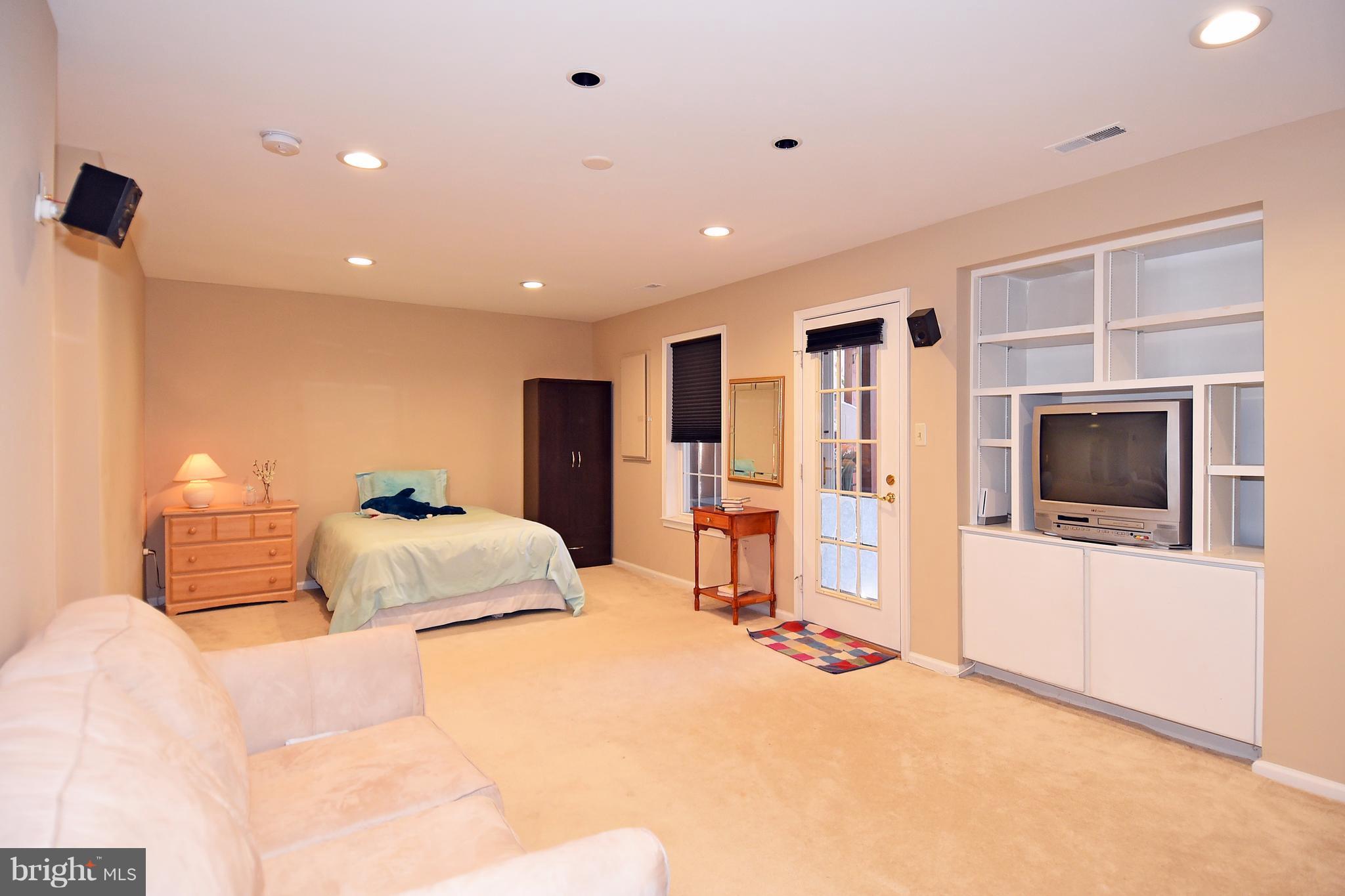20677 Riptide Square Sterling, VA 20165 - Photo 18 of 26 Rec Room with door to fenced backyard