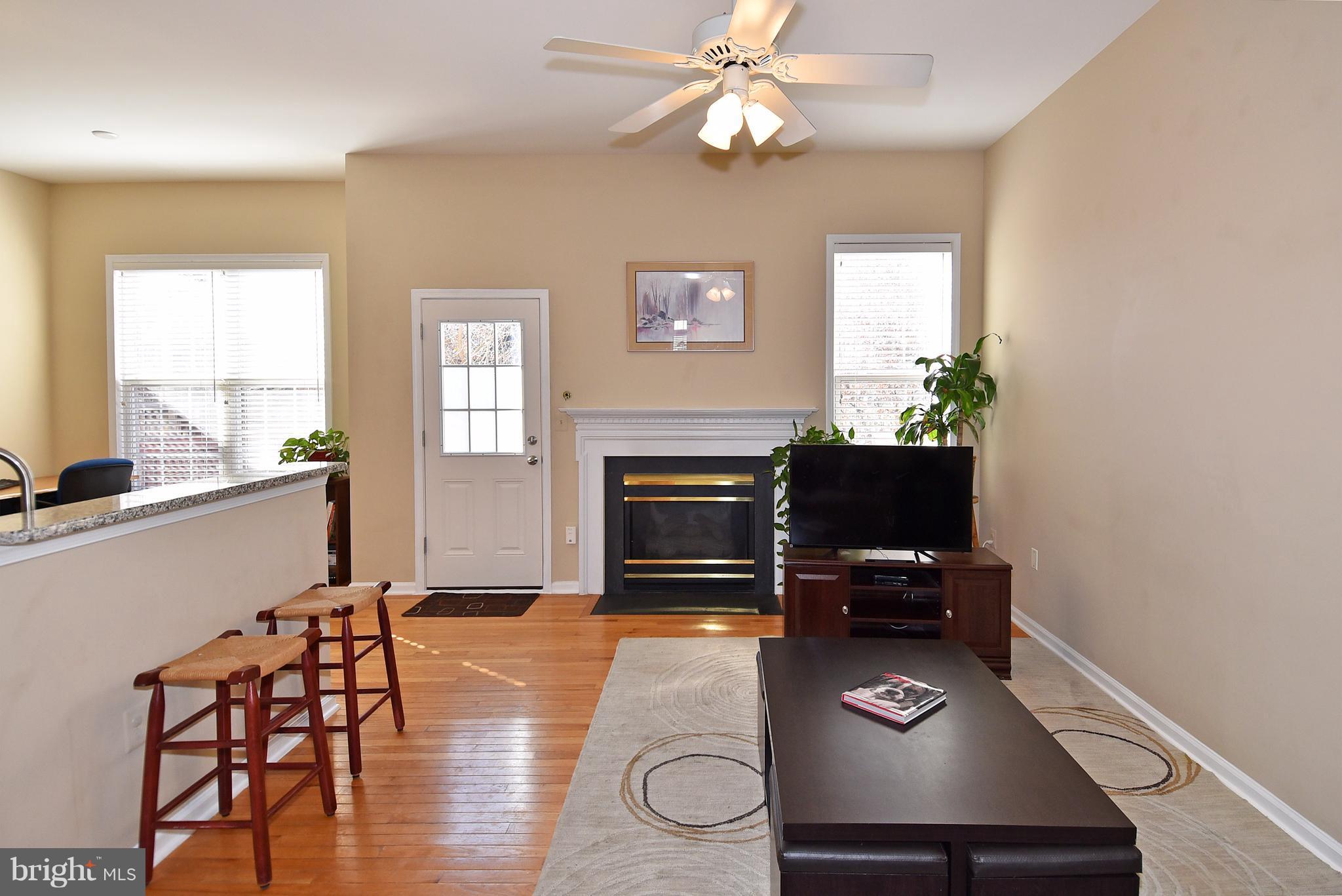 20677 Riptide Square Sterling, VA 20165 - Photo 5 of 26 Cozy family room off of the kitchen