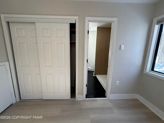 a bathroom with a sink a vanity and a mirror