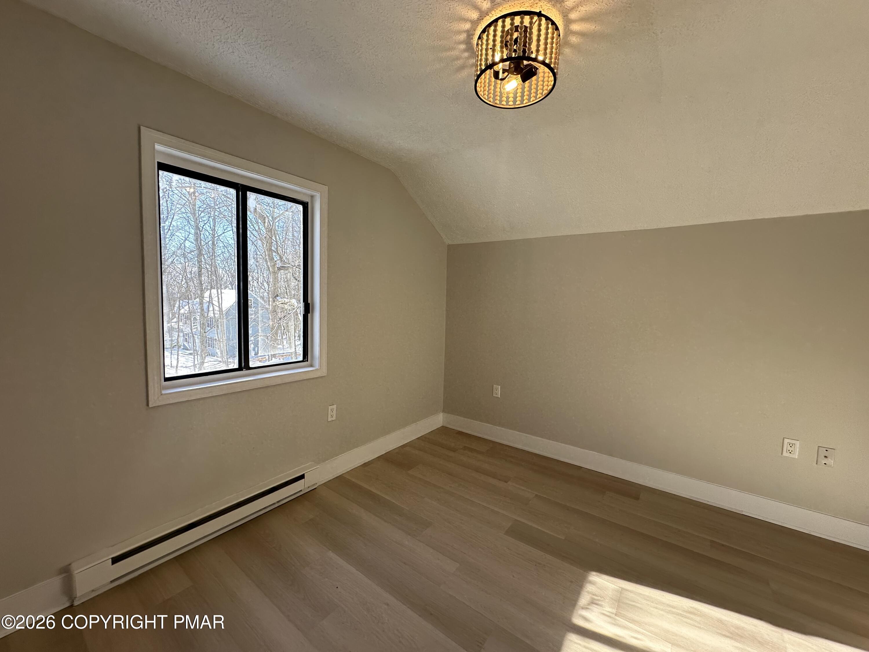 147 Pocono Boulevard Bushkill, PA 18324 - Photo 27 of 28 an empty room with a window