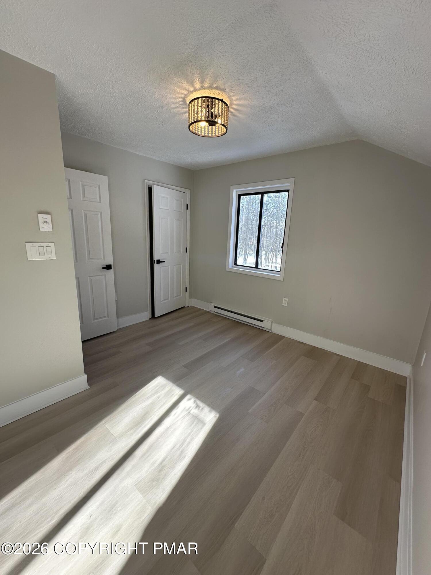 147 Pocono Boulevard Bushkill, PA 18324 - Photo 28 of 28 a view of an empty room and window