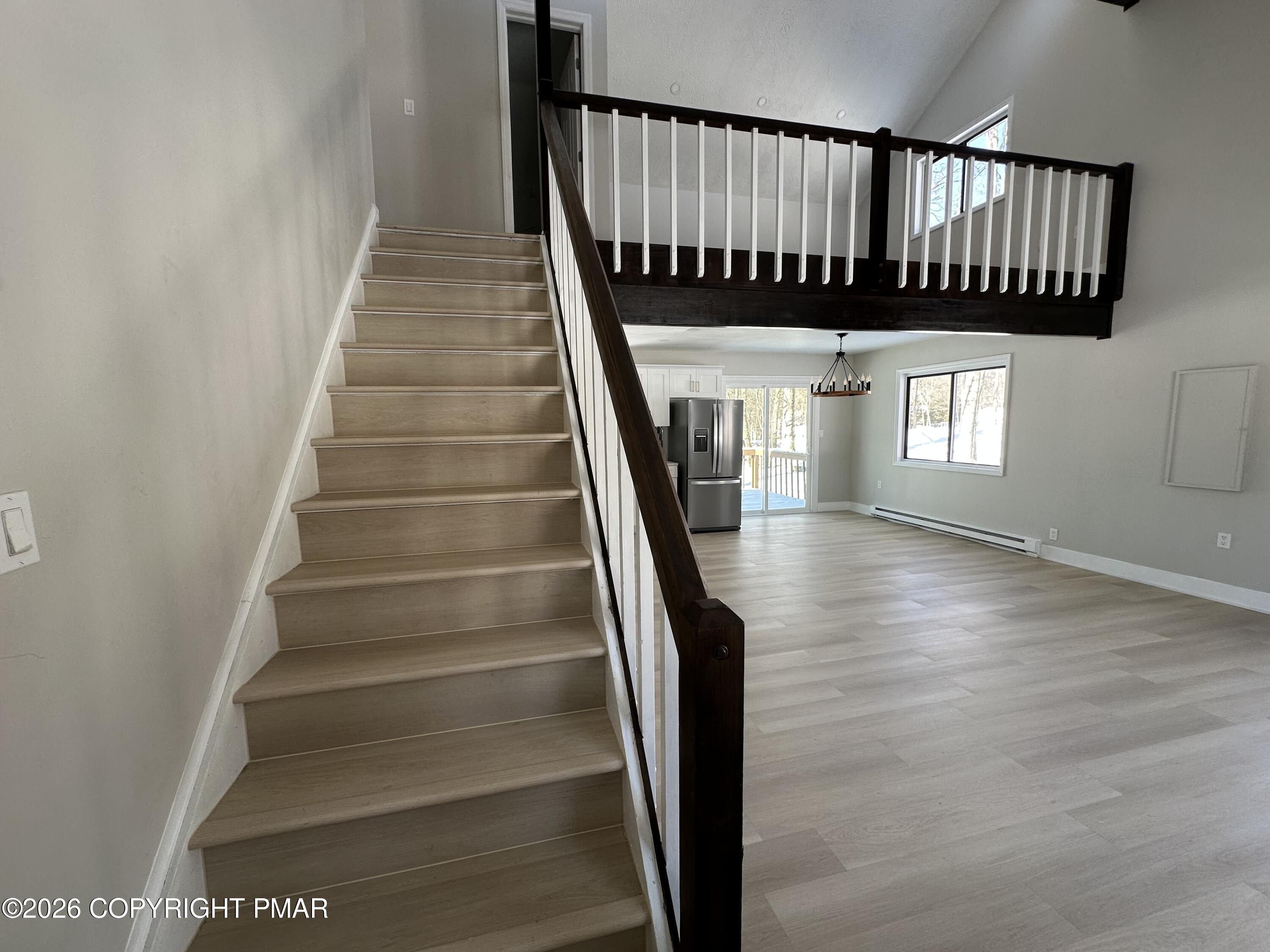 147 Pocono Boulevard Bushkill, PA 18324 - Photo 6 of 28 a view of entryway and hall with wooden floor