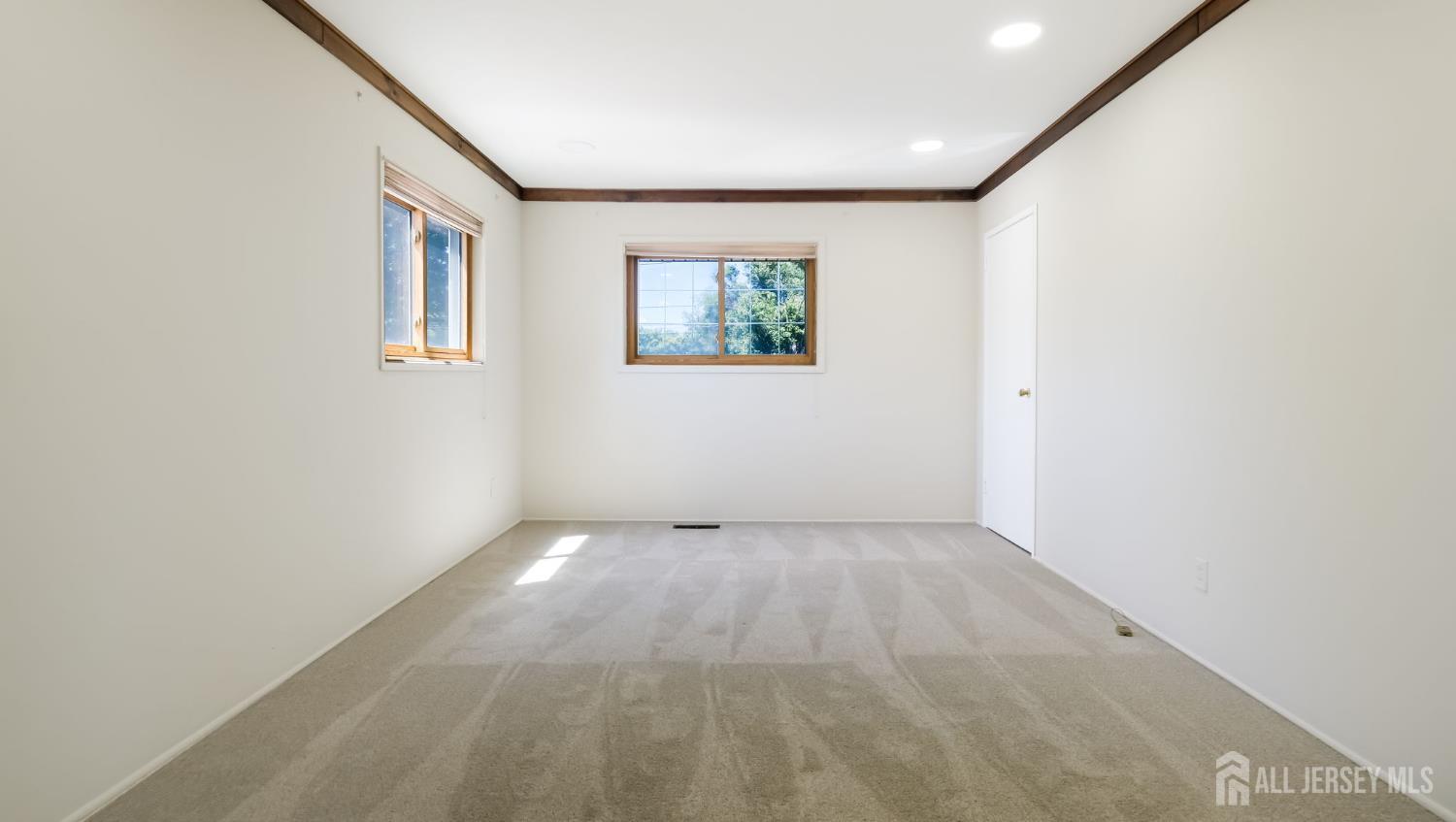 50 Sand Hills Road Kendall Park, NJ 08824 - Photo 15 of 27 an empty room with windows