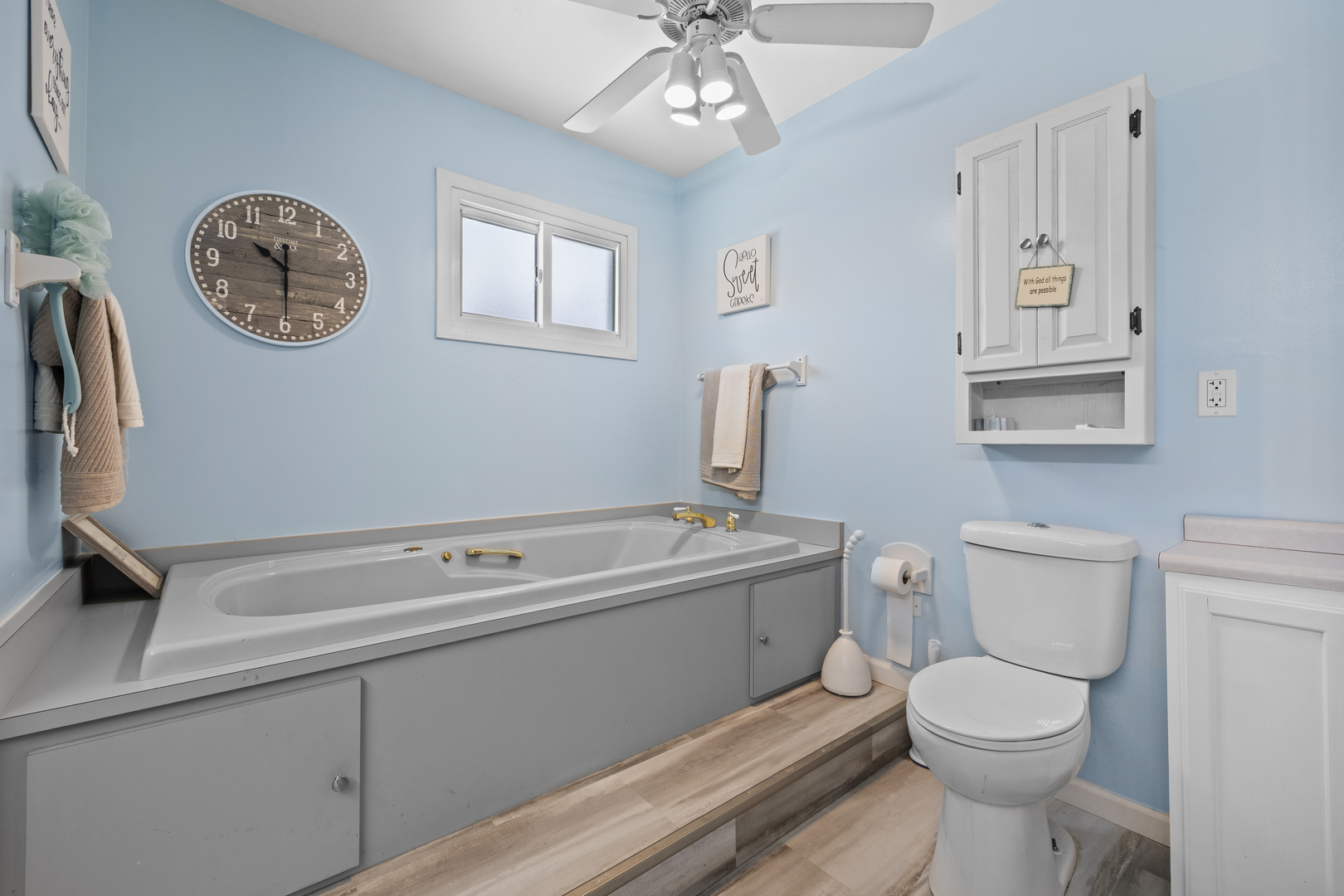 4 Saugatuck Road Montgomery, IL 60538 - Photo 15 of 24 a bathroom with a toilet a sink and a mirror