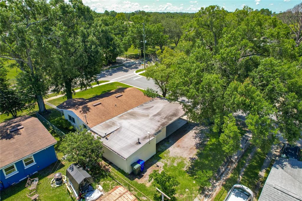1025 South Central Avenue Lakeland, FL 33815 - Photo 3 of 42 an aerial view of a house with a yard basket ball court and outdoor seating