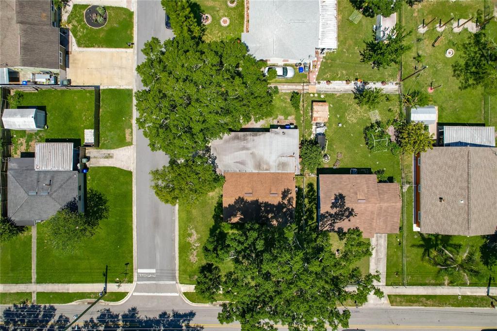 1025 South Central Avenue Lakeland, FL 33815 - Photo 7 of 42 an aerial view of a house with a yard and fountain