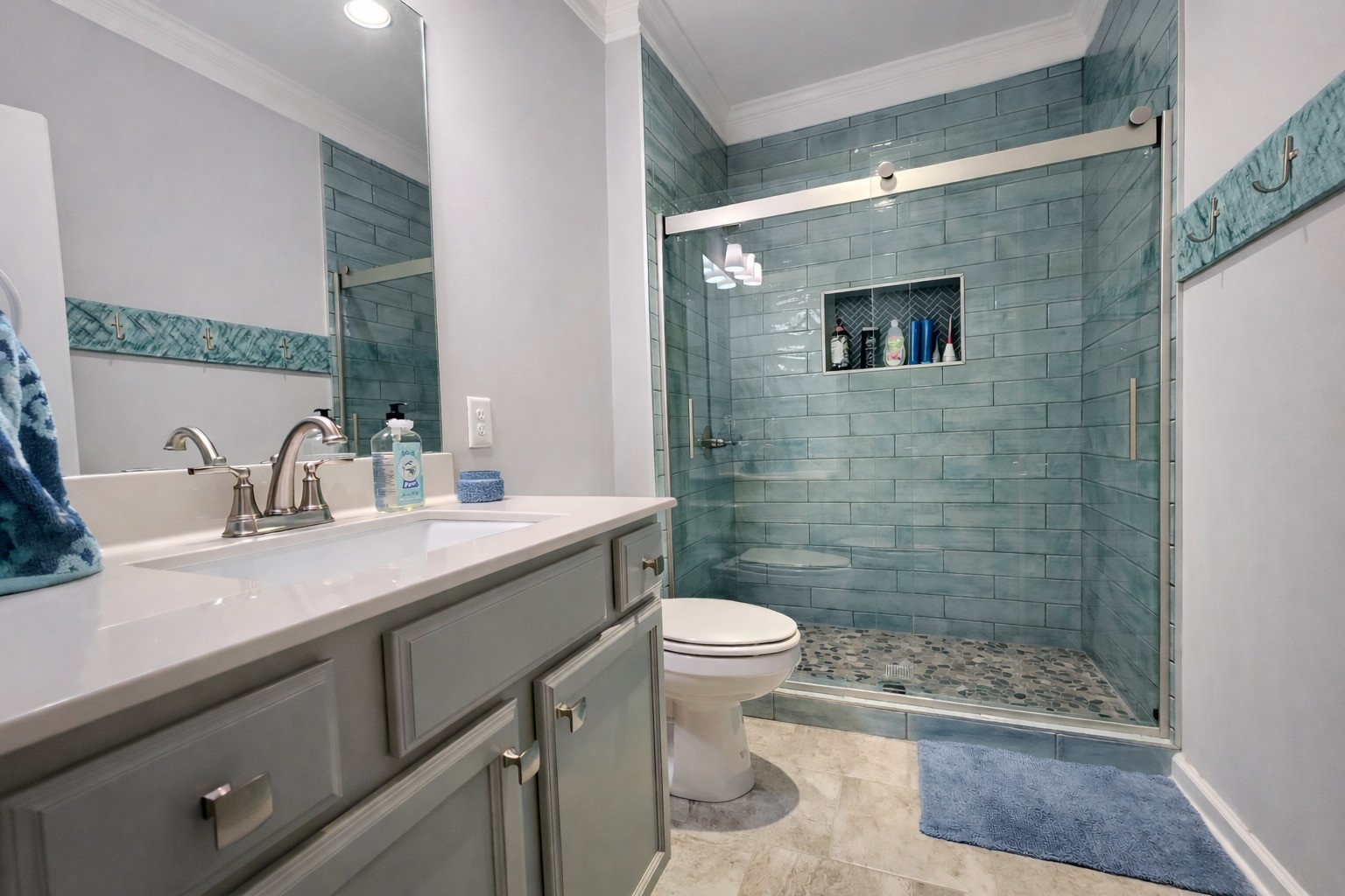 2519 Bridgeway Street Murfreesboro, TN 37128 - Photo 14 of 18 a bathroom with a sink a toilet and shower