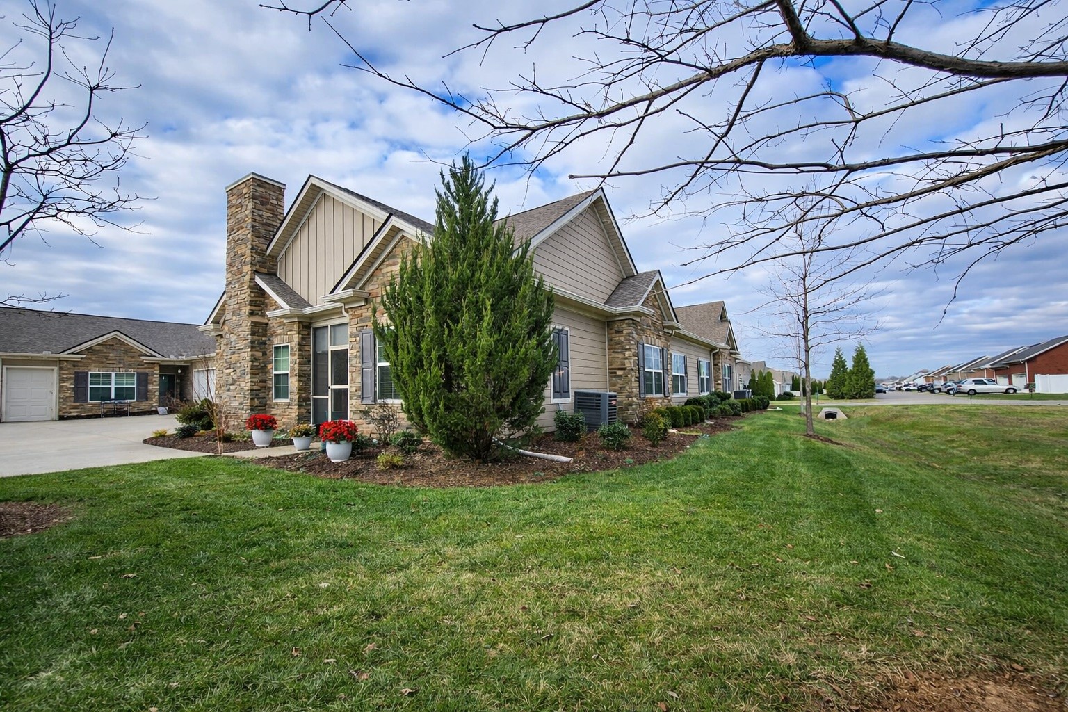 2519 Bridgeway Street Murfreesboro, TN 37128 - Photo 4 of 18 a view of a house with a big yard and large trees