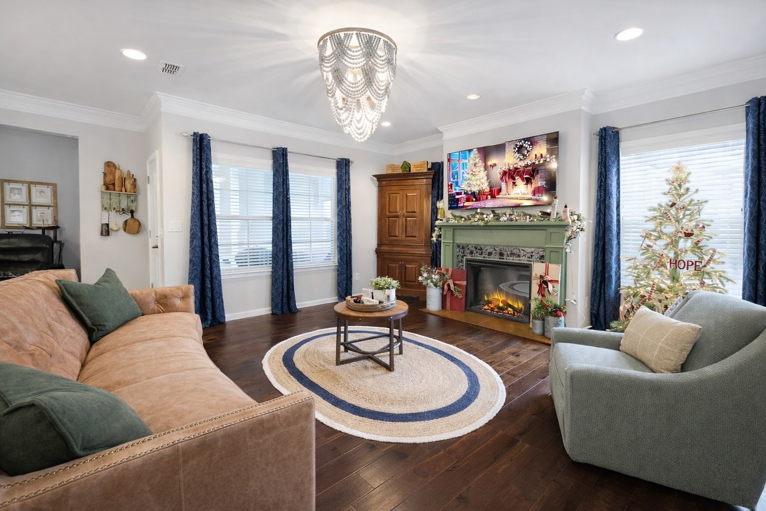 2519 Bridgeway Street Murfreesboro, TN 37128 - Photo 5 of 18 a living room with furniture a fireplace and a flat screen tv