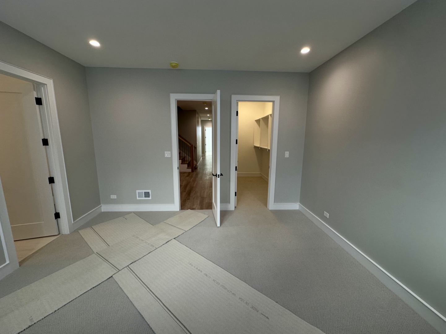 4243 North Damen Avenue, Unit 1R Chicago, IL 60618 - Photo 30 of 38 an empty room with closet and a bathroom