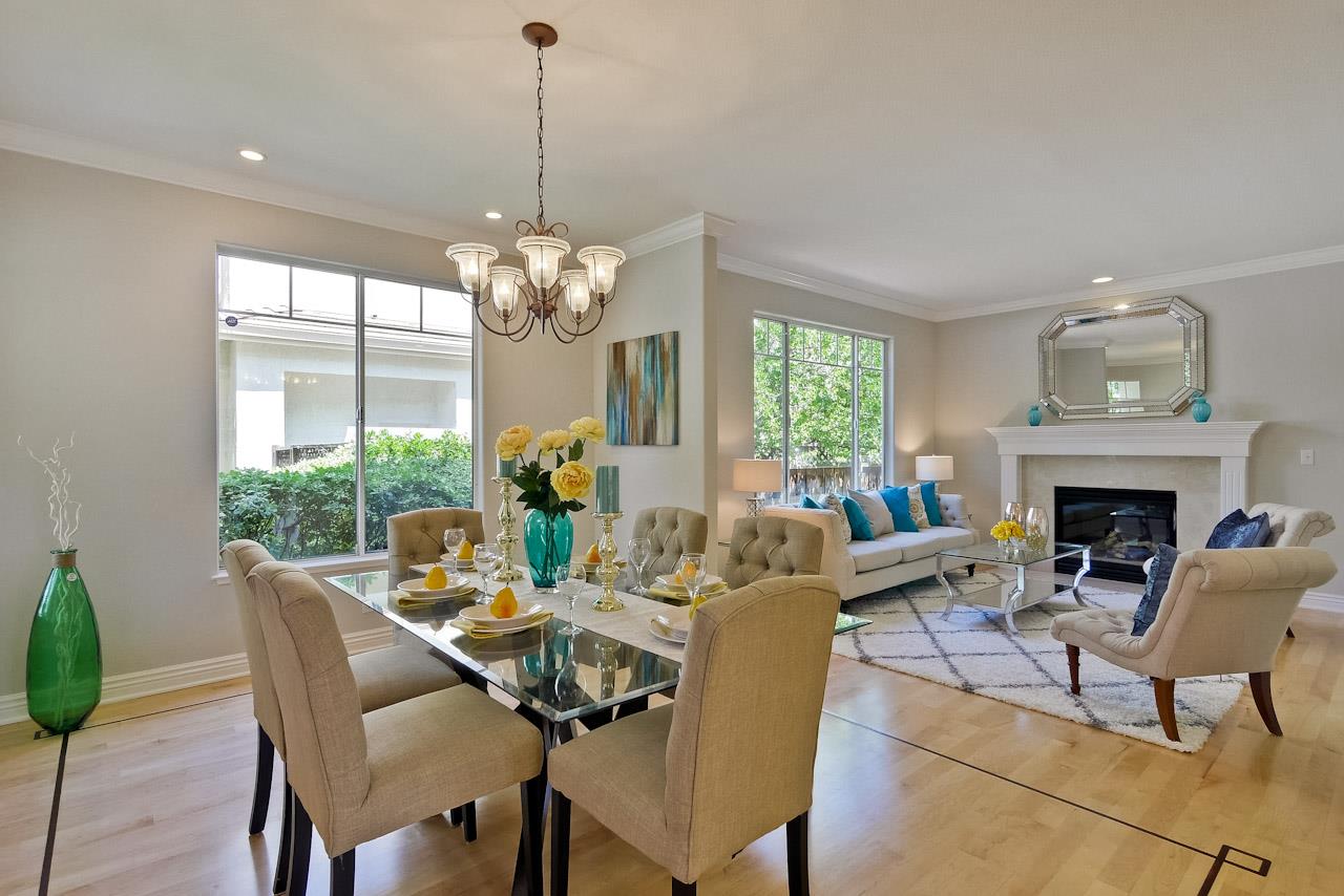 7648 Echo Hill Court Cupertino, CA 95014 - Photo 13 of 50 a dining room with furniture a fireplace and large windows