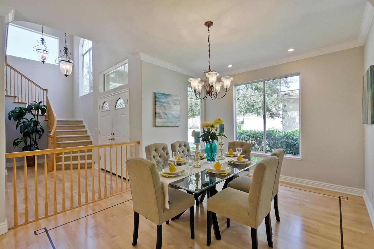 7648 Echo Hill Court Cupertino, CA 95014 - Photo 14 of 50 a view of a dining room with furniture window and wooden floor
