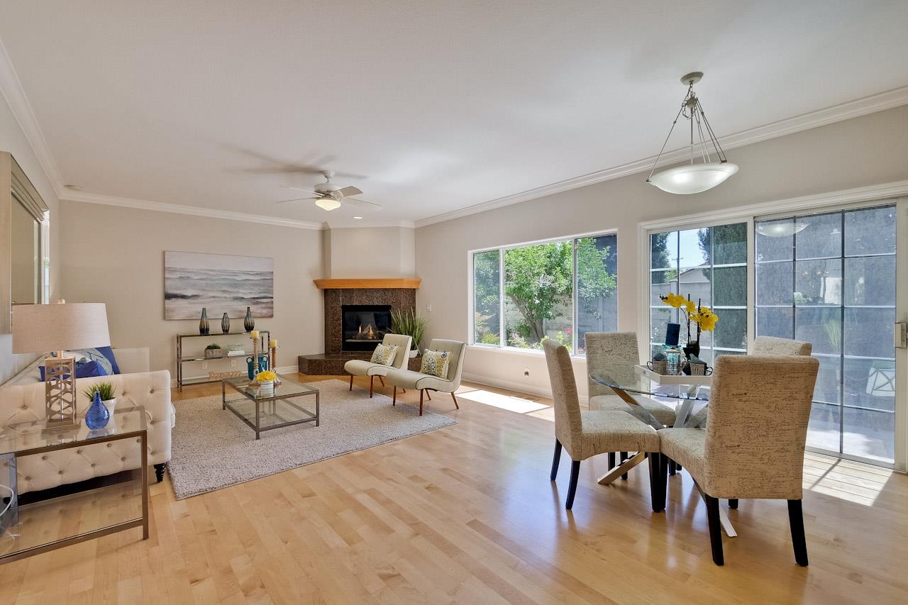 7648 Echo Hill Court Cupertino, CA 95014 - Photo 20 of 50 a view of a livingroom with furniture window and wooden floor
