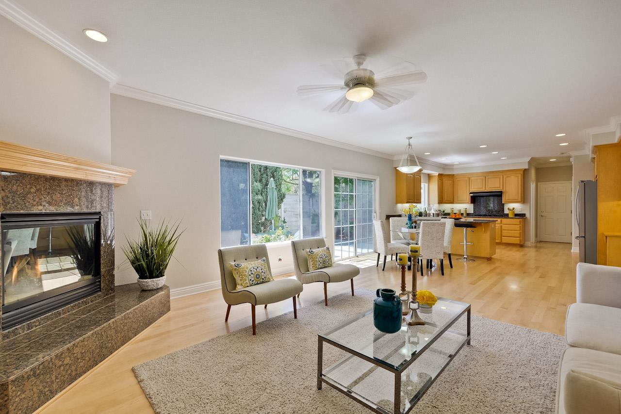 7648 Echo Hill Court Cupertino, CA 95014 - Photo 29 of 50 a living room with furniture and a fireplace