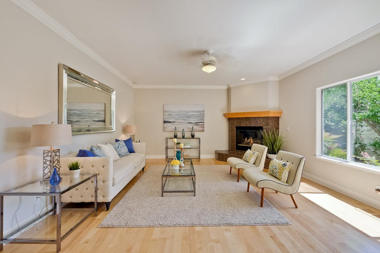 7648 Echo Hill Court Cupertino, CA 95014 - Photo 30 of 50 a living room with furniture and a fireplace