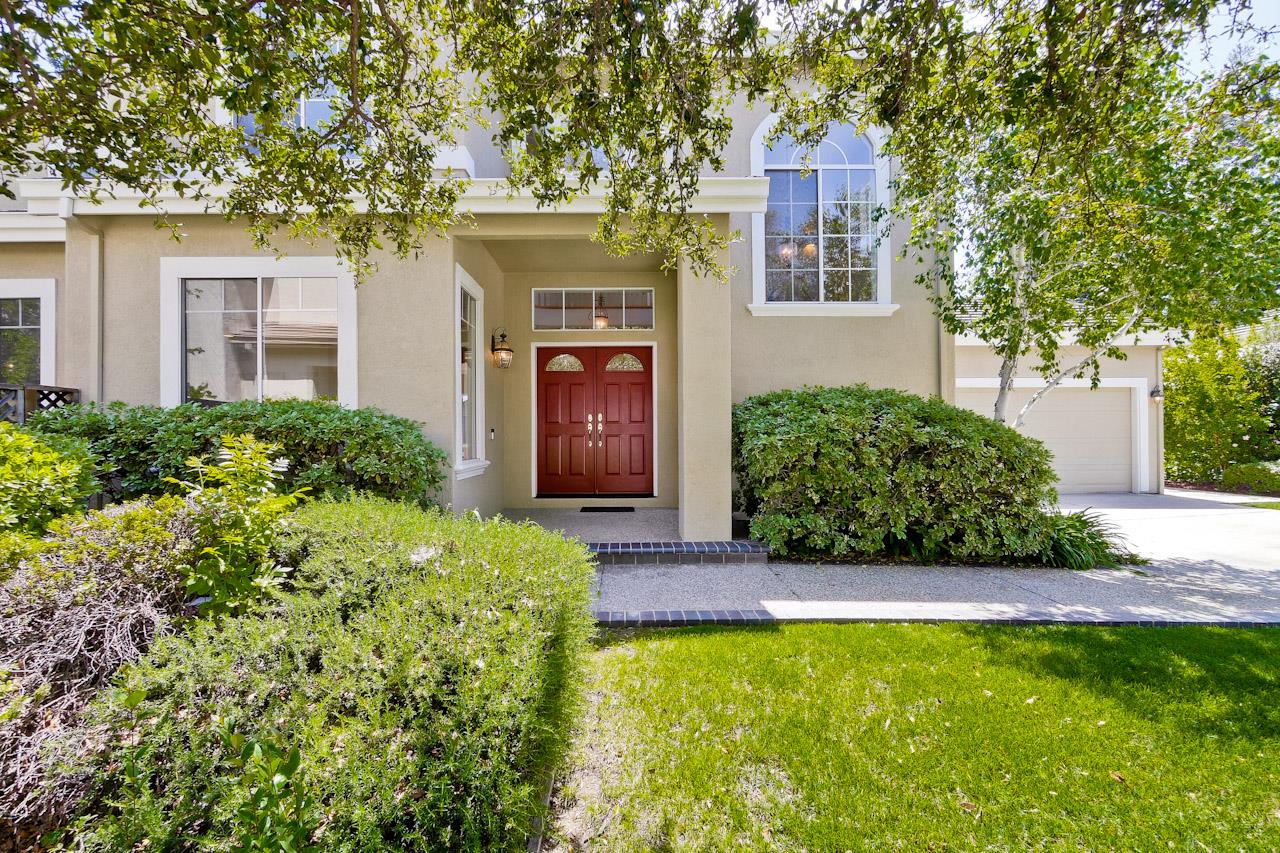 7648 Echo Hill Court Cupertino, CA 95014 - Photo 3 of 50 a front view of a house with garden