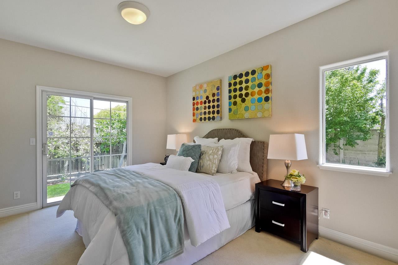 7648 Echo Hill Court Cupertino, CA 95014 - Photo 31 of 50 a bedroom with a bed and a window