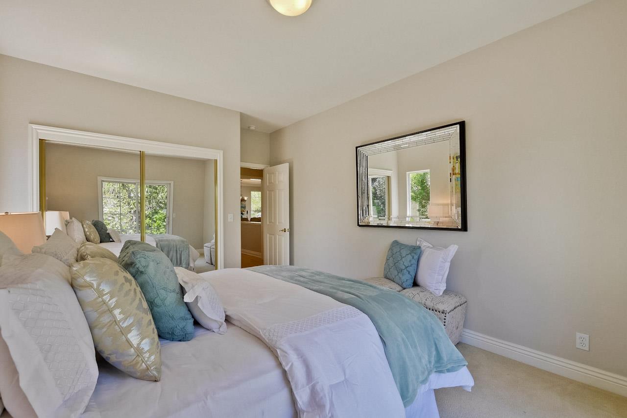 7648 Echo Hill Court Cupertino, CA 95014 - Photo 33 of 50 a bedroom with a bed and a painting on the wall