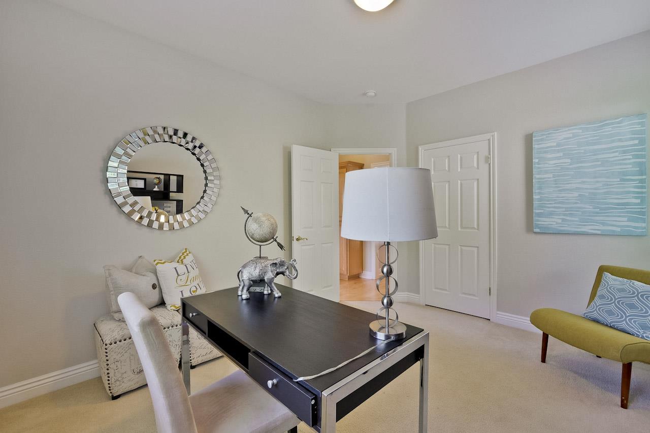 7648 Echo Hill Court Cupertino, CA 95014 - Photo 35 of 50 a living room with furniture and a table