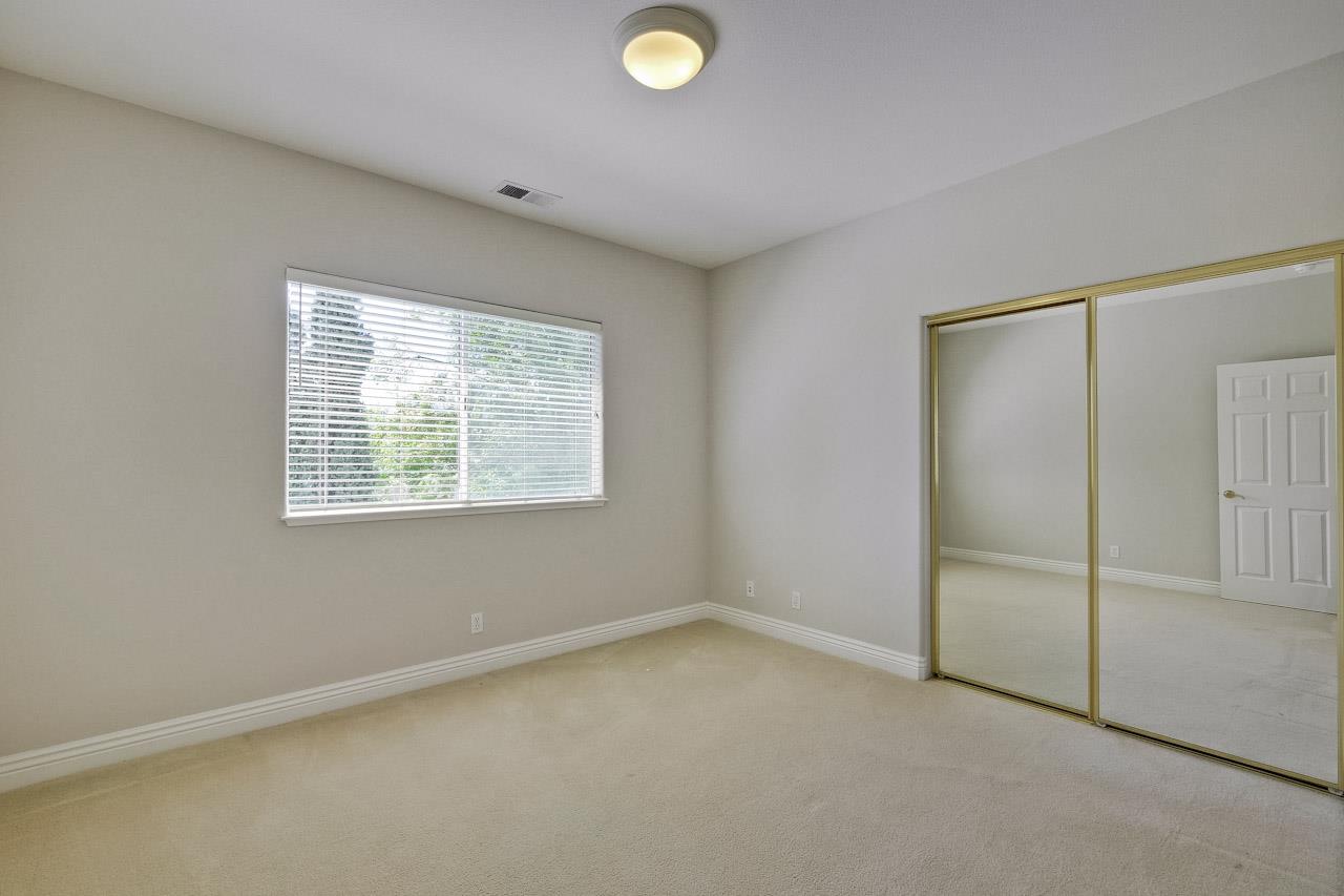 7648 Echo Hill Court Cupertino, CA 95014 - Photo 42 of 50 an empty room with windows and closet
