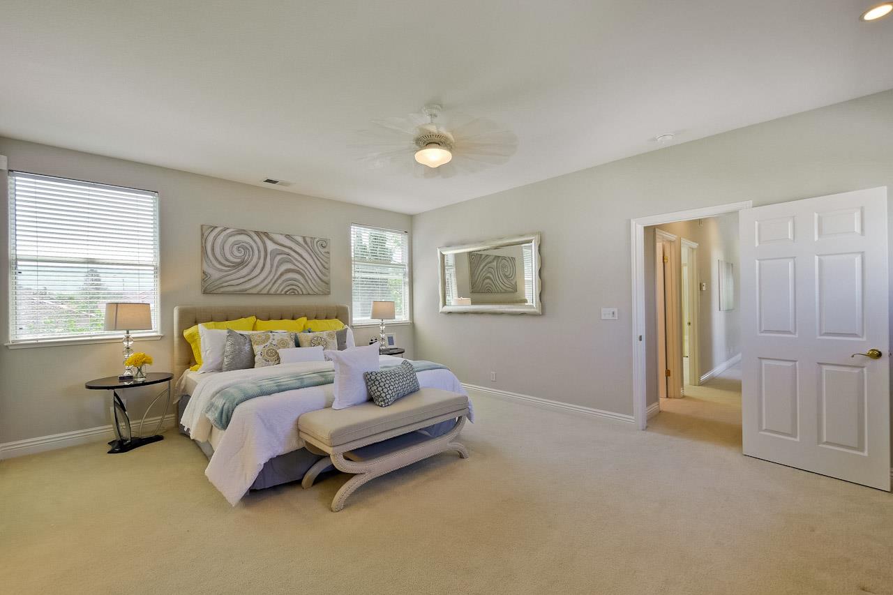 7648 Echo Hill Court Cupertino, CA 95014 - Photo 48 of 50 a bedroom with a bed and a night stand