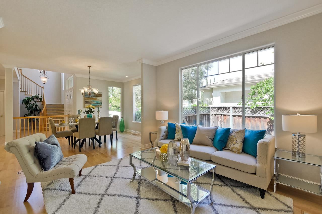 7648 Echo Hill Court Cupertino, CA 95014 - Photo 8 of 50 a living room with furniture and a large window