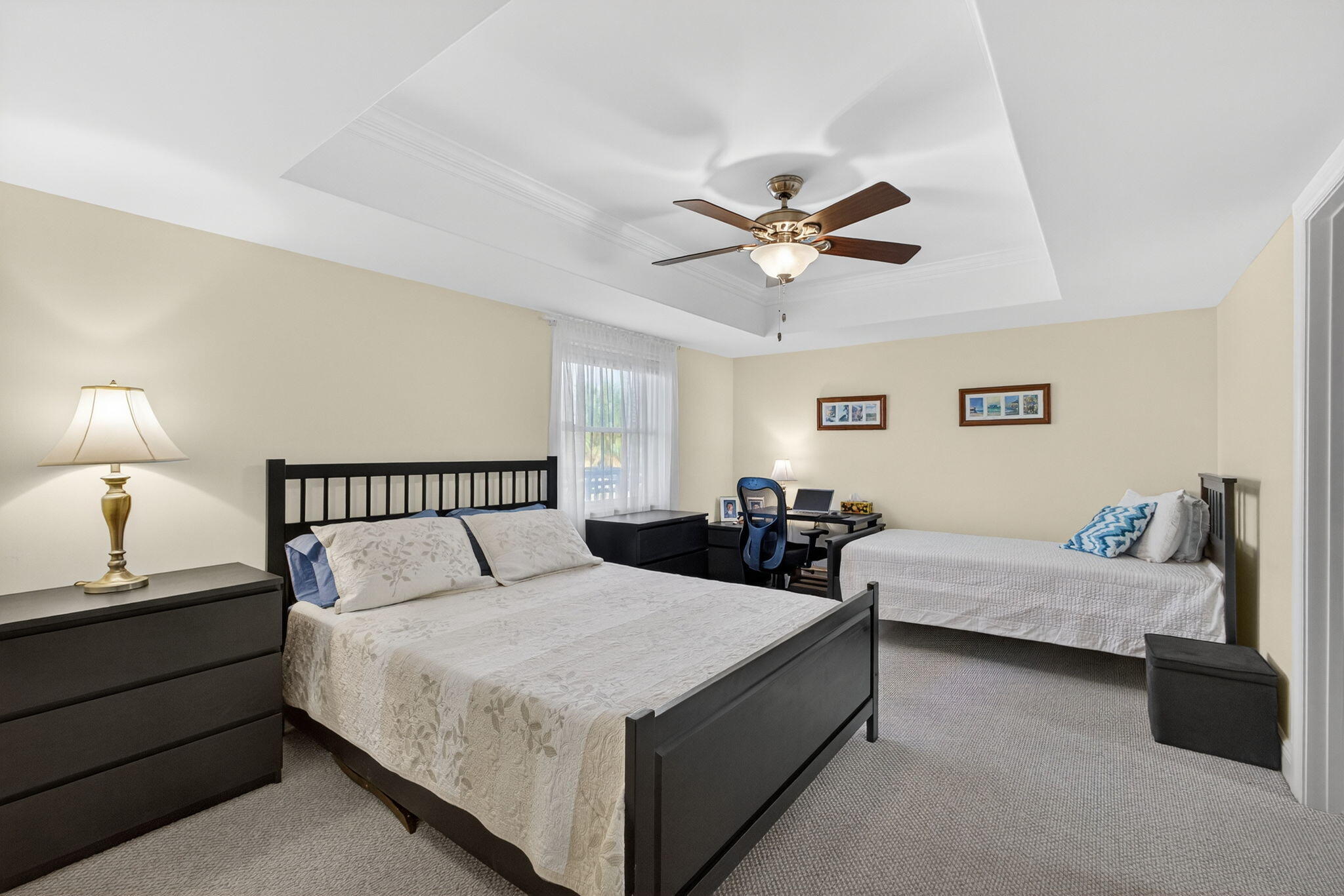 129 South Golfview Road, Unit 7 Lake Worth Beach, FL 33460 - Photo 24 of 79 a bed room with two bed and a lamp