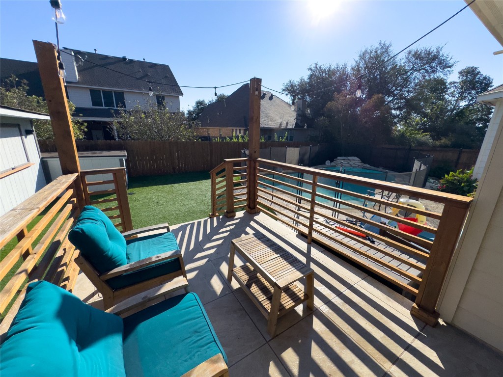 2410 Aspen Meadow Road Leander, TX 78641 - Photo 21 of 24 a view of a bench in the roof deck