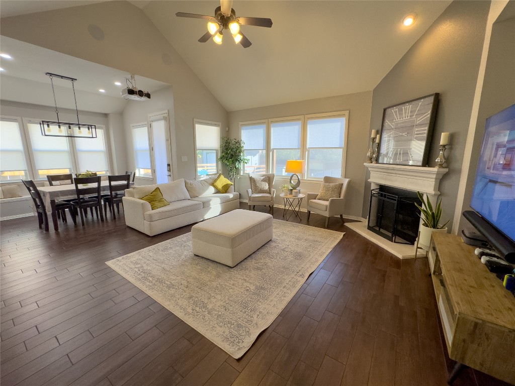 2410 Aspen Meadow Road Leander, TX 78641 - Photo 3 of 24 a living room with furniture and a fireplace