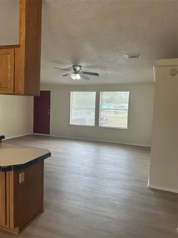 an empty room with windows