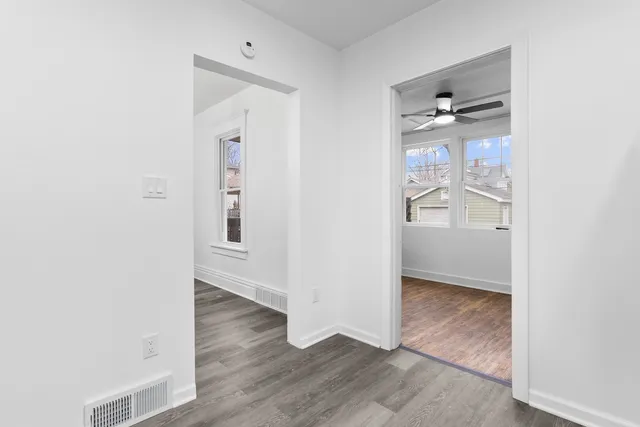 an empty room and wooden floor