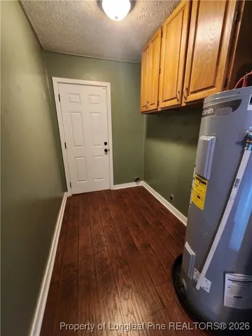 a view of front door with wooden floor