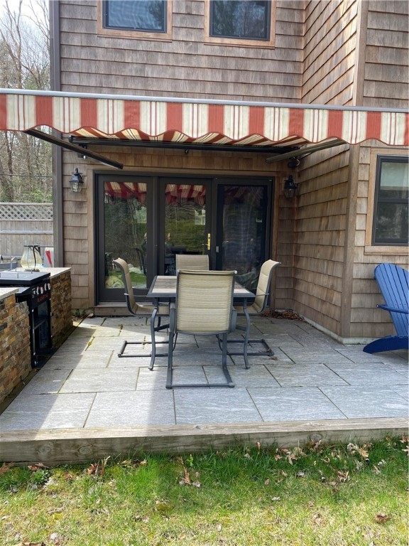 162 Indian Trail Glocester, RI 02814 - Photo 3 of 21 Patio with awning.