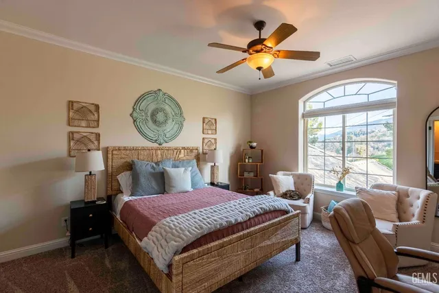 an aerial view of a house with a lake view