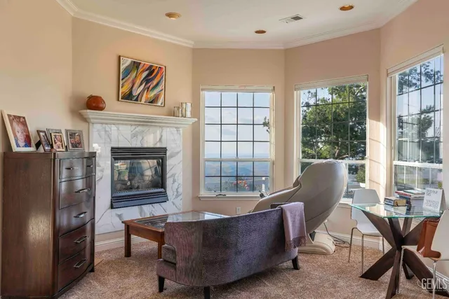an aerial view of a house with a lake view