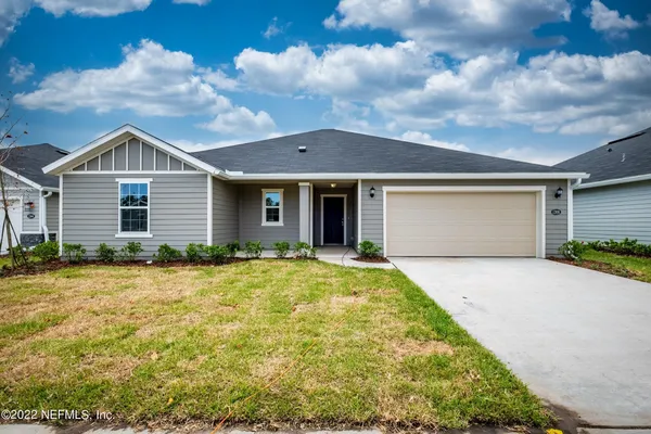 front view of house with a yard
