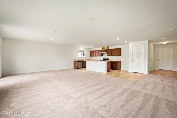 a view of a kitchen with a sink