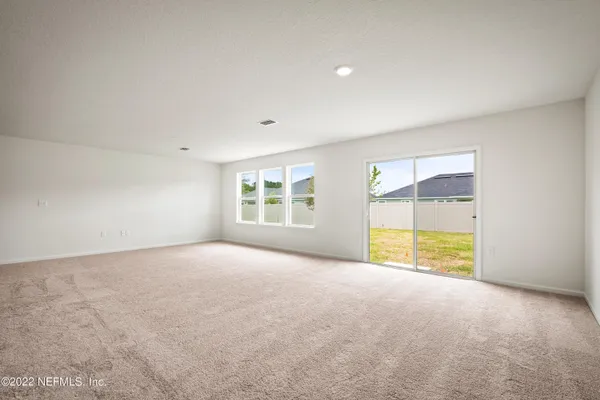 an empty room with a natural light