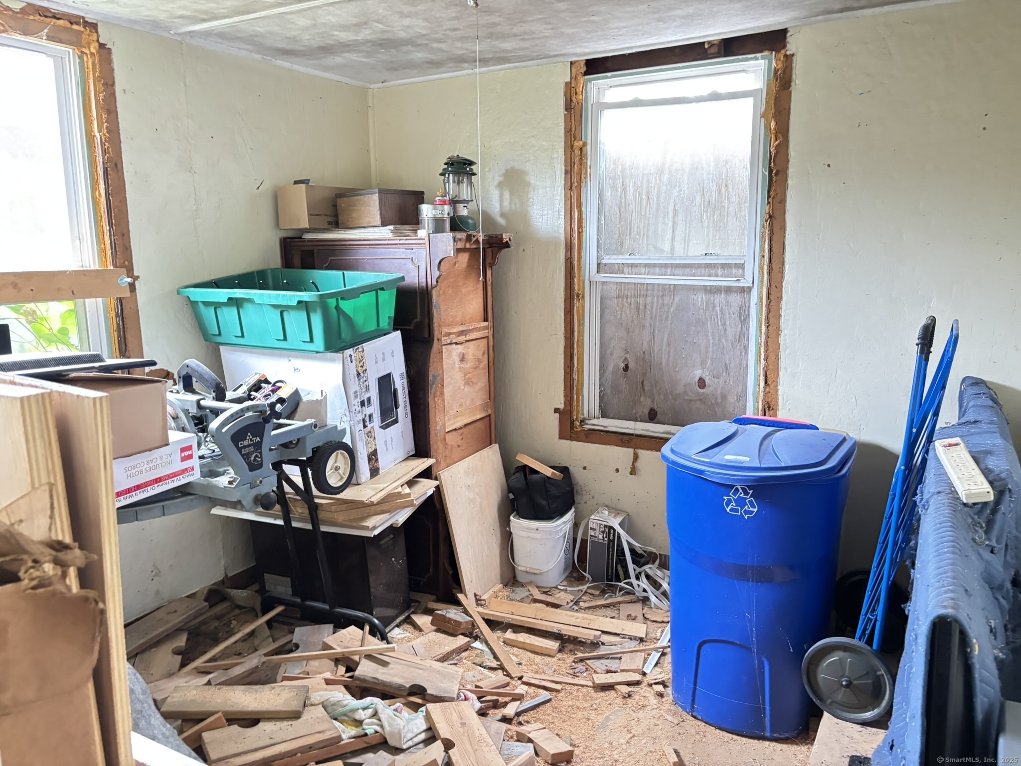 1405 New Haven Road Naugatuck, CT 06770 - Photo 7 of 27 a room with furniture and a window