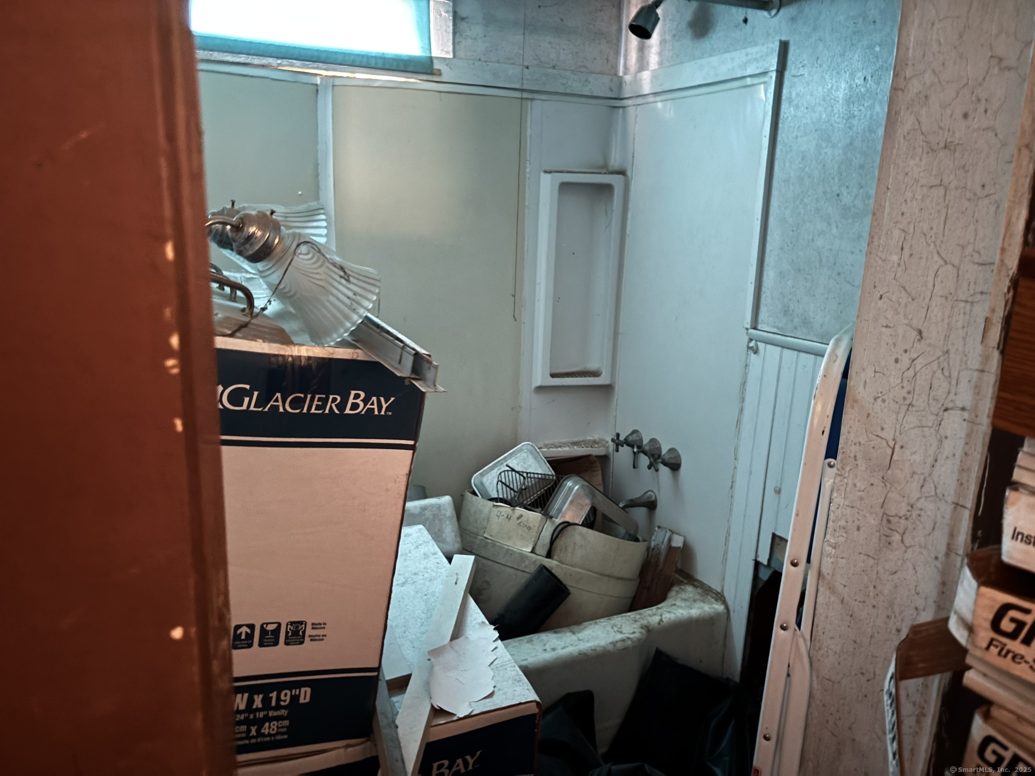 1405 New Haven Road Naugatuck, CT 06770 - Photo 9 of 27 a living room with furniture and a potted plant