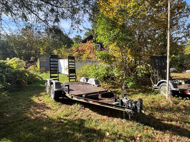 a view of a house with a yard porch and sitting area